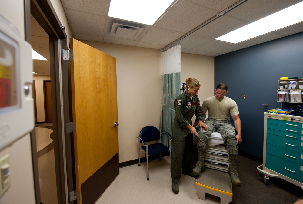 Airmen perform flight medicine exams