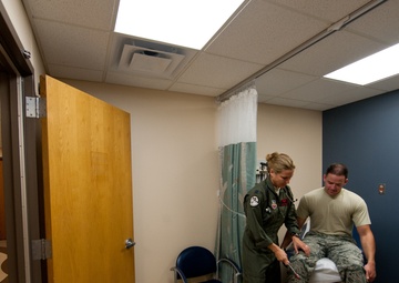 Airmen perform flight medicine exams
