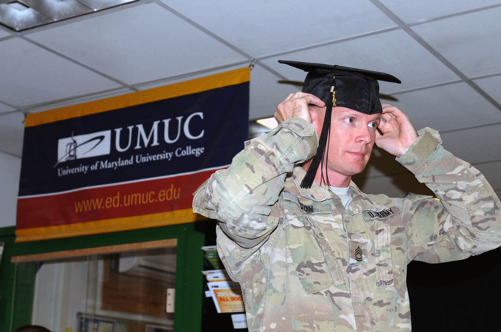 20 years after high school, a soldier graduates