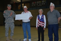 West Fargo veteran groups present donation in support of local military families