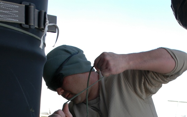 Riggers of 623rd QM help keep vehicles off of the road and out of harm’s way