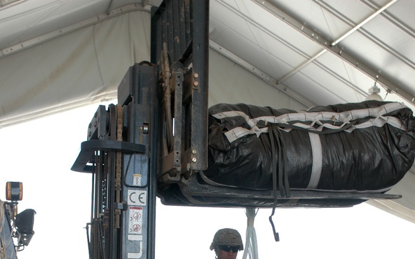 Riggers of 623rd QM help keep vehicles off of the road and out of harm’s way