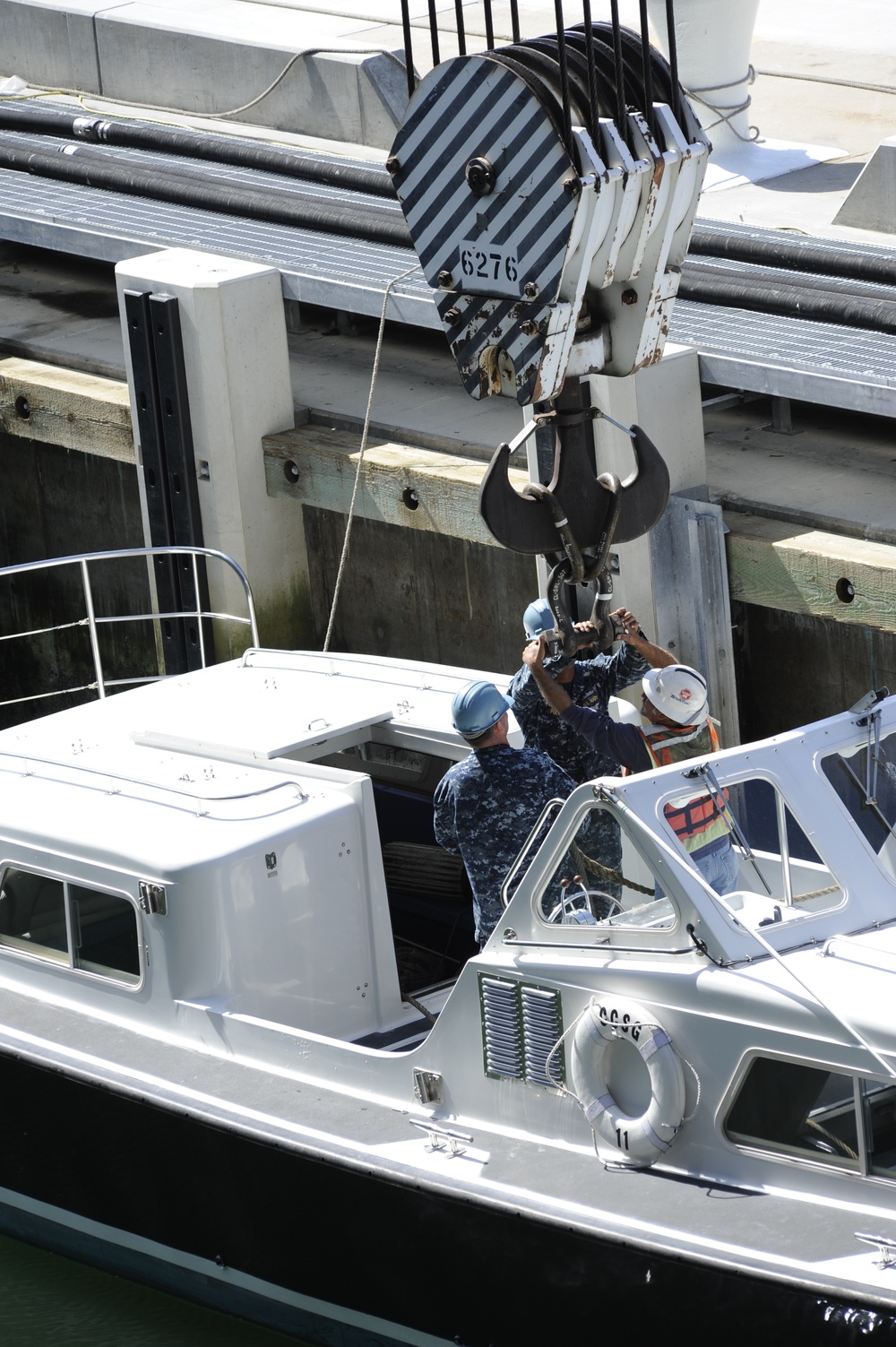 Sailors prepare admiral's barge