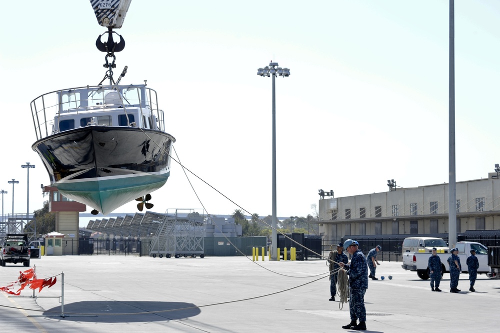 Sailors prepare admiral's barge