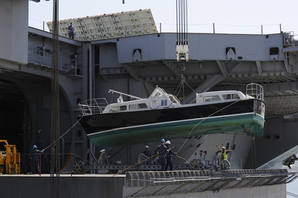 Sailors prepare admiral's barge