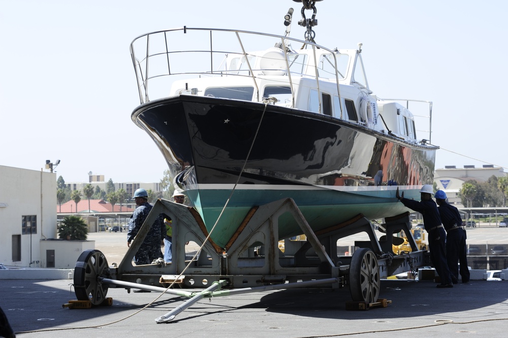 Sailors prepare admiral's barge