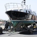 Sailors prepare admiral's barge