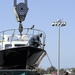 Sailors prepare admiral's barge