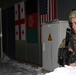 Multinational forces bury their tracks along the snow-covered 'Black Forest' region of Bavaria