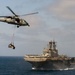 MH-60S Sea Hawk delivers cargo to USS Makin Island