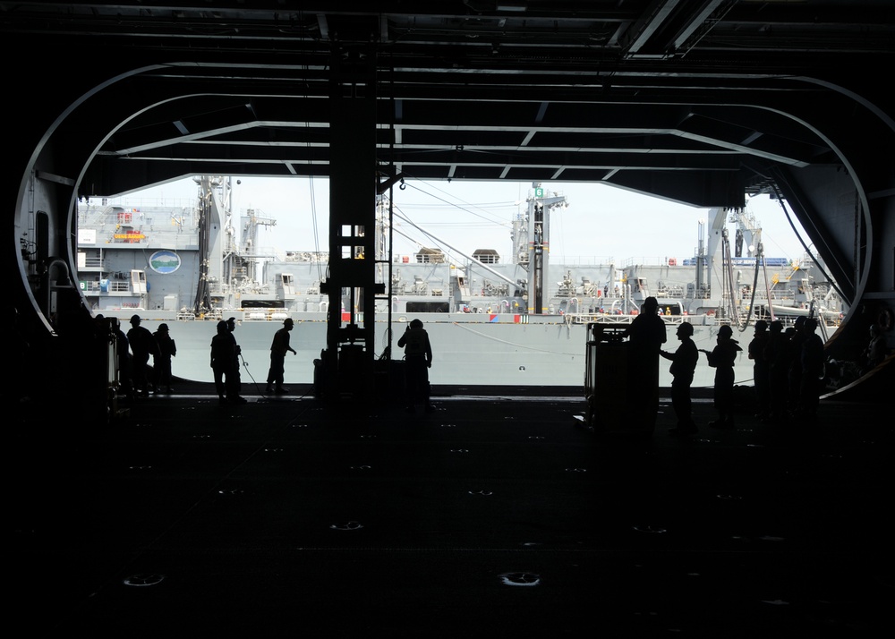 USS Nimitz receives cargo load