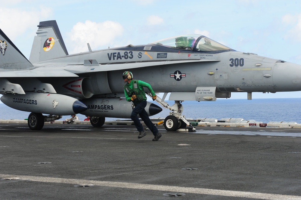 USS Dwight D. Eisenhower sailor at work