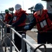 USS Pearl Harbor sailors at work