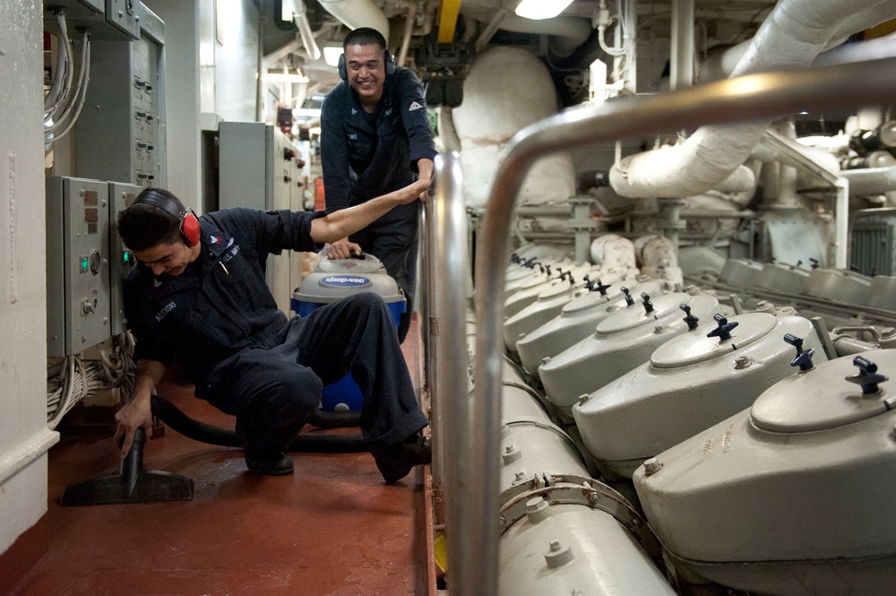 USS Pearl Harbor sailors at work