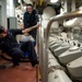 USS Pearl Harbor sailors at work