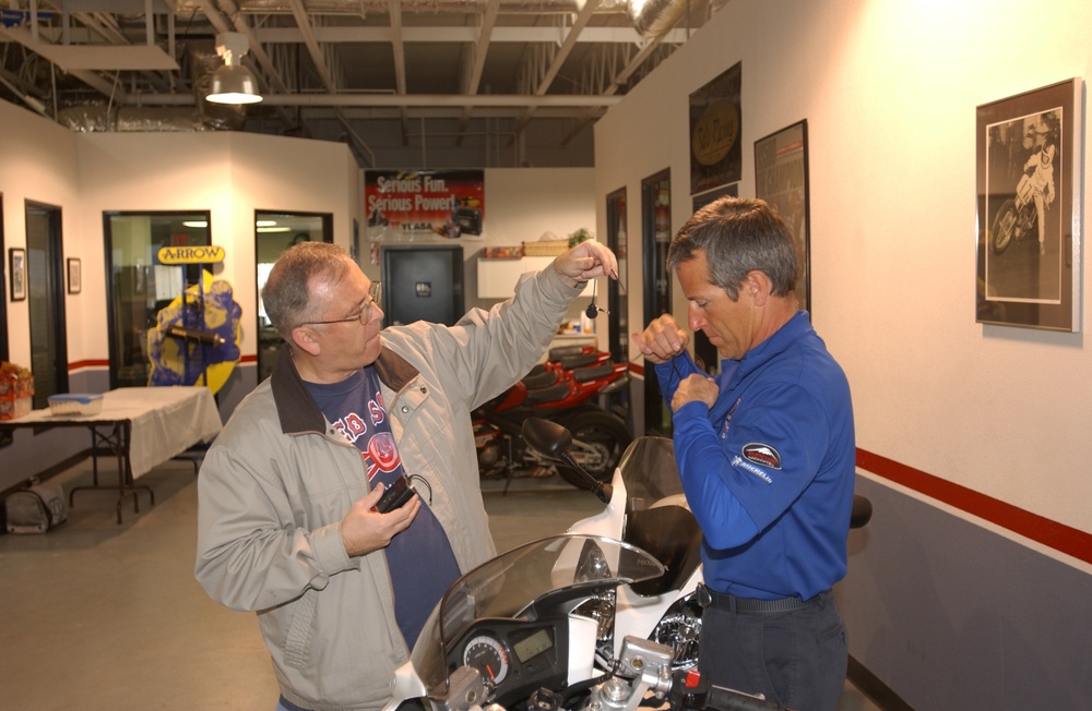 Dan Steber gets Nick Ienatsch ready for video shoot