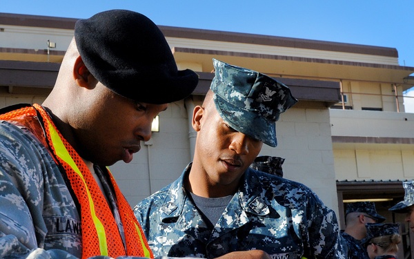 Security forces go door to door