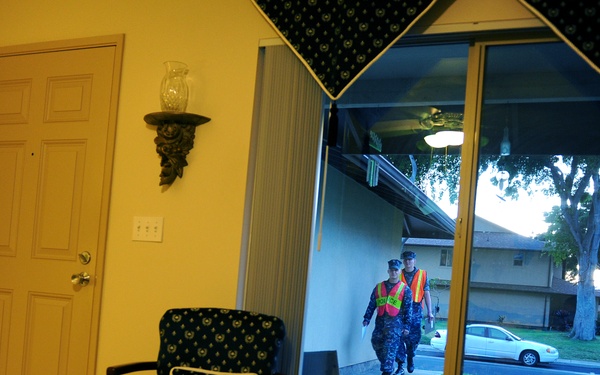 Security forces go door to door