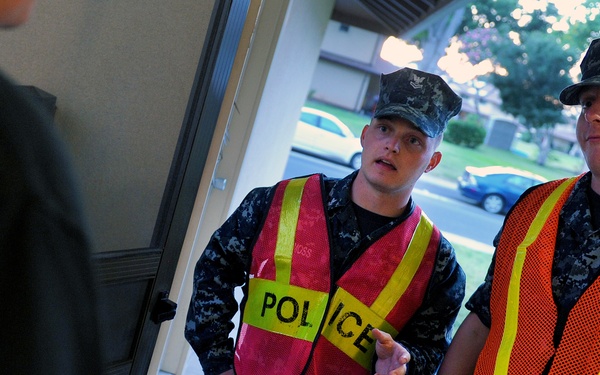 Security forces go door to door