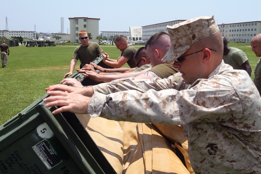 Bulk fuel Marines set up, run amphibious assault fuel system