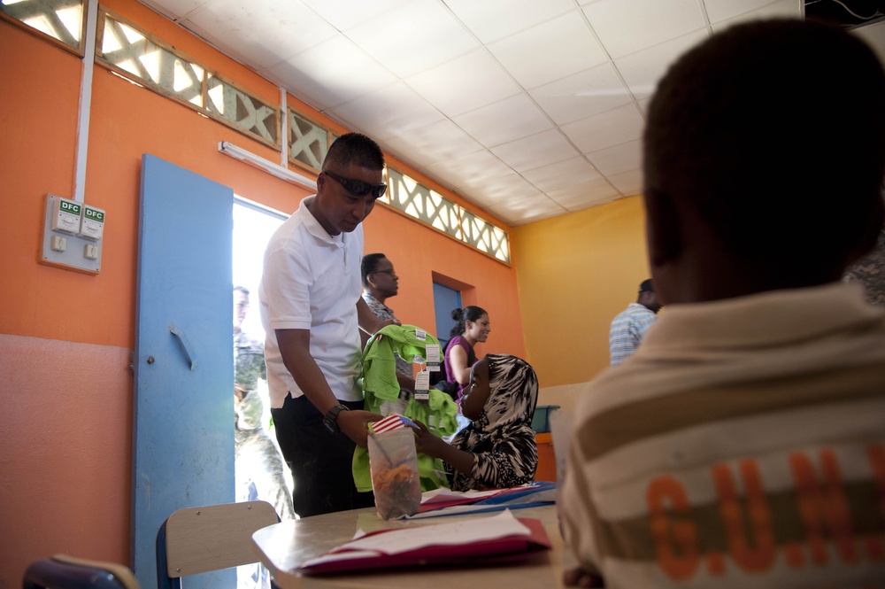 Camp Lemonnier Volunteer Group Distributes School Supplies to Djiboutian Kids