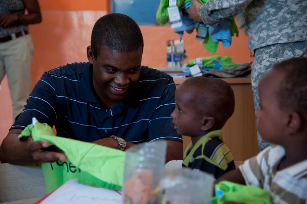Camp Lemonnier Volunteer Group Distributes School Supplies to Djiboutian Kids