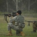US service members compete in an international machine gun match during AASAM 2012