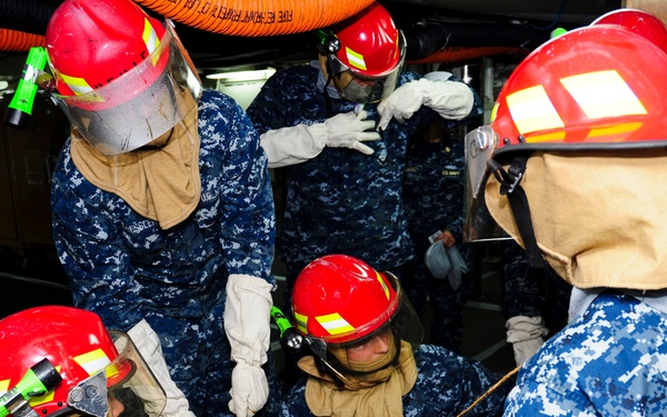 USS Ronald Regan sailors conduct damage control drill
