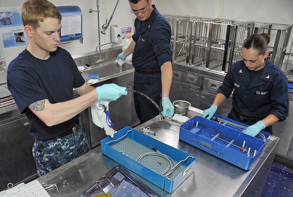 Cleaning scopes for sterilization