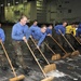 Scrubbing the ship's hangar bay