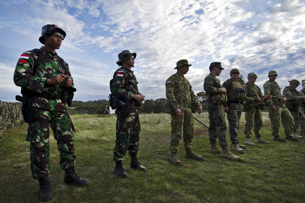 US Marines and soldiers compete in international pistol cometition during AASAM 2012