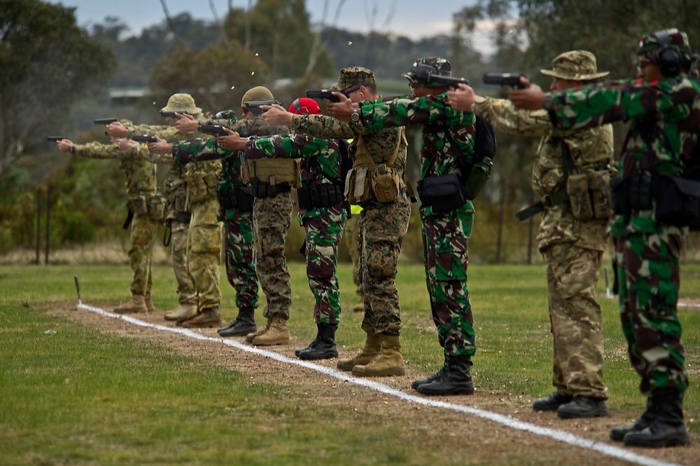 US Marines and soldiers compete in international pistol cometition during AASAM 2012