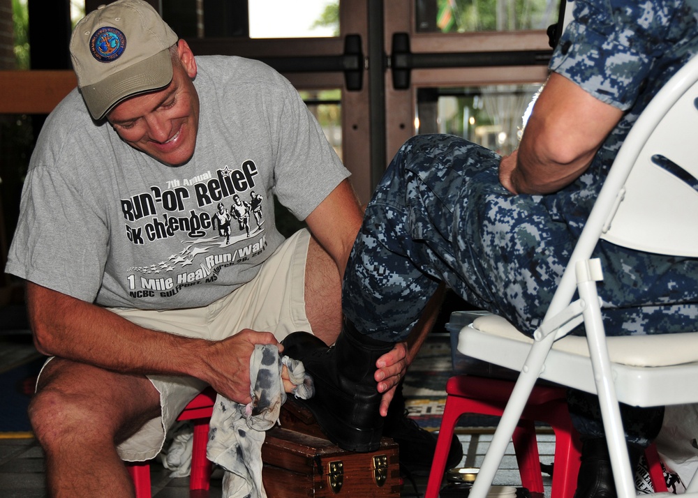 NCBC XO shines boots for NMCRS fundraiser