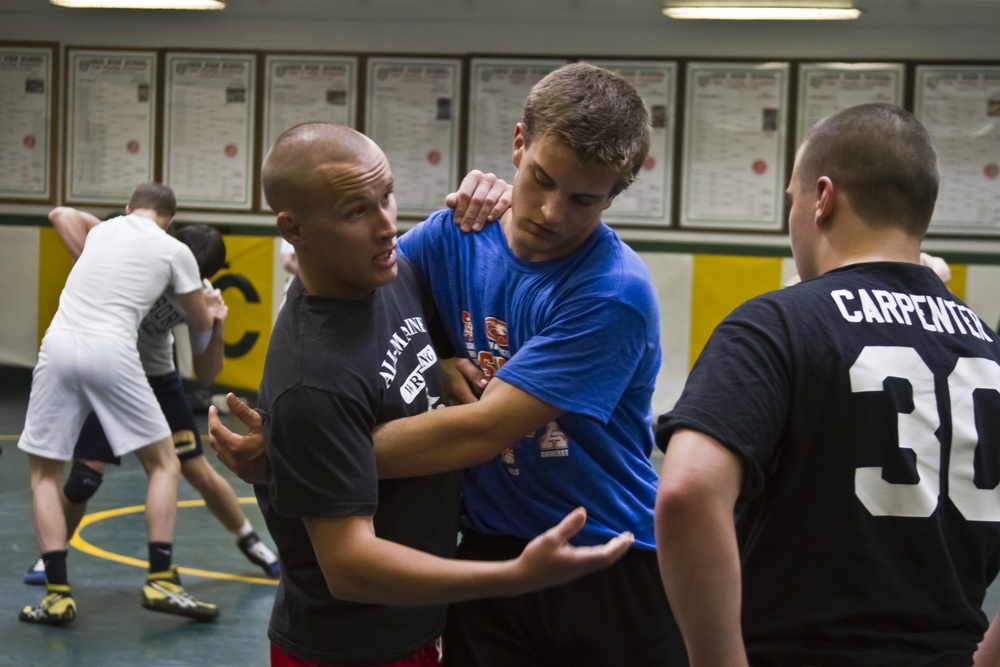 Cleveland youth learn wrestling from the Corps’ best