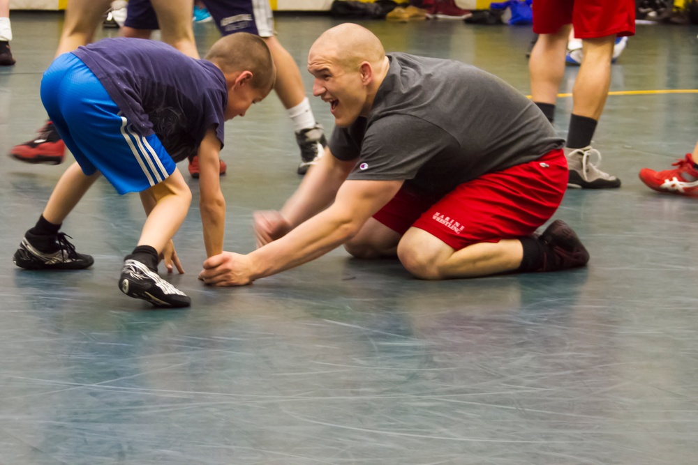 Cleveland youth learn wrestling from the Corps' best