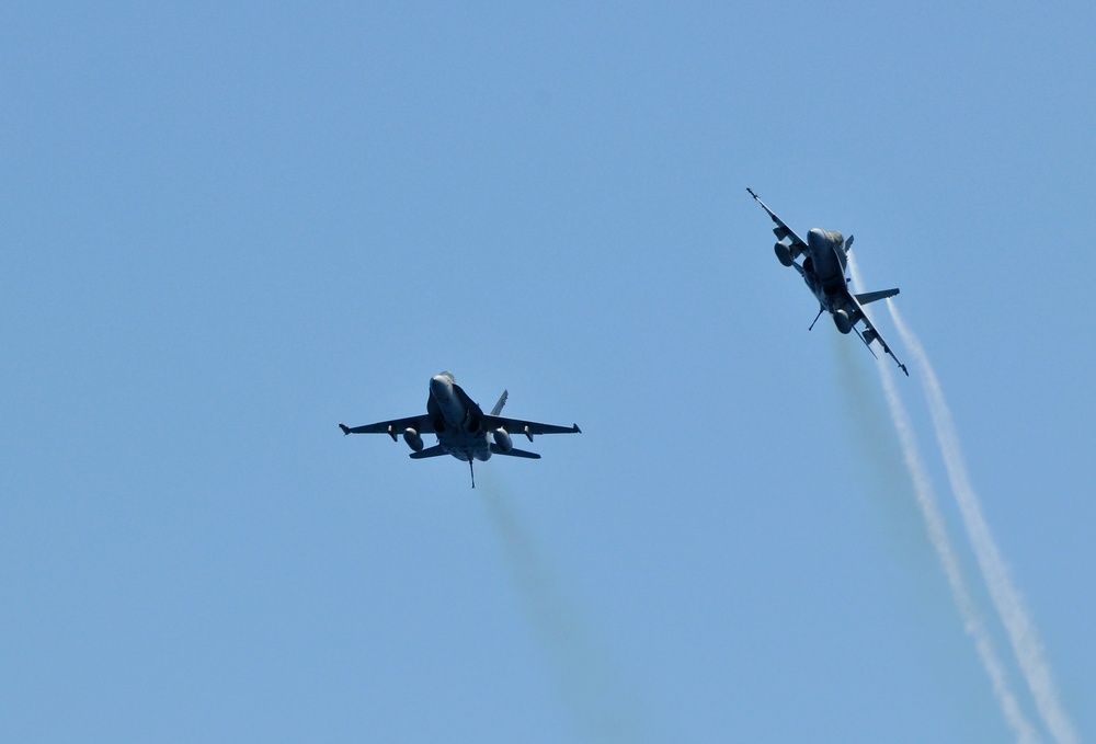 F/A-18C Hornets fly over