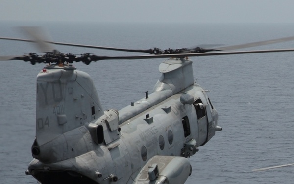 Company I fast ropes at sea