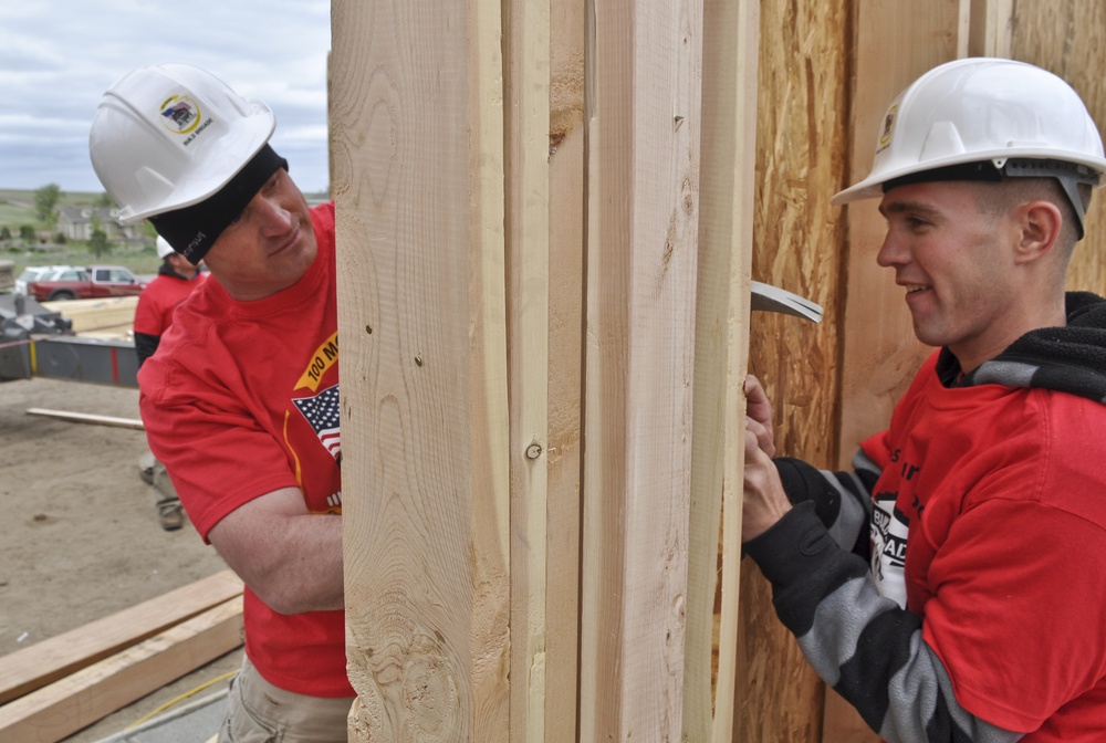 Buckley service members support home construction for injured vet