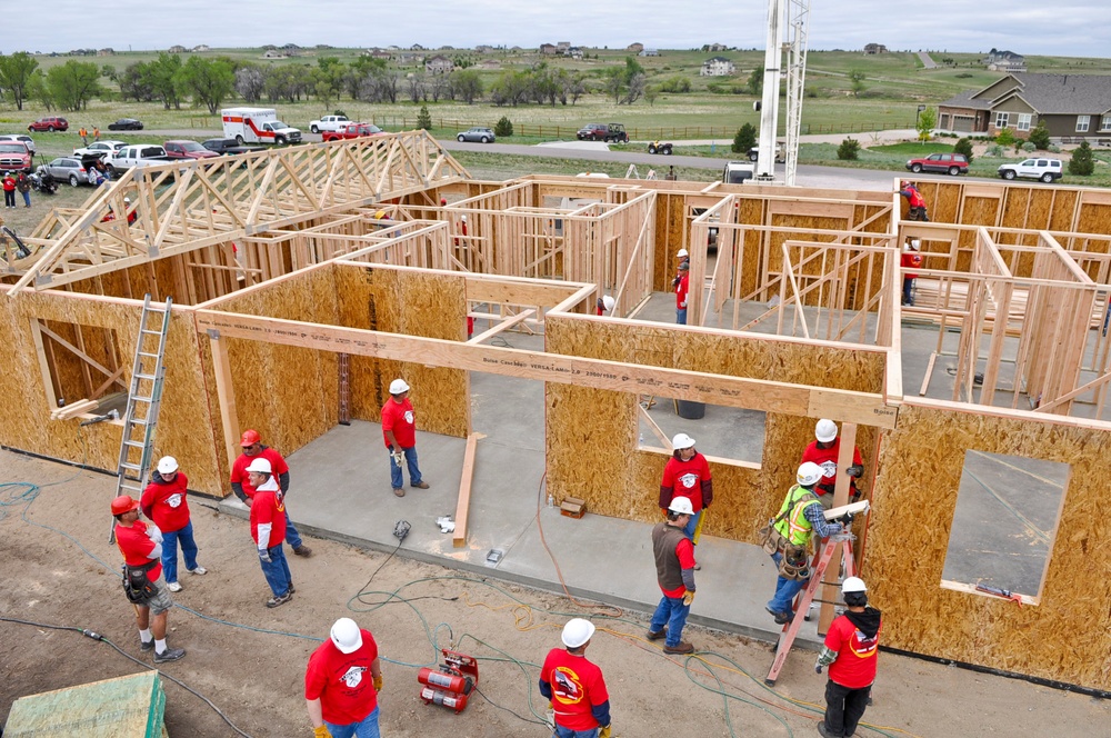 Buckley service members support home construction for injured vet