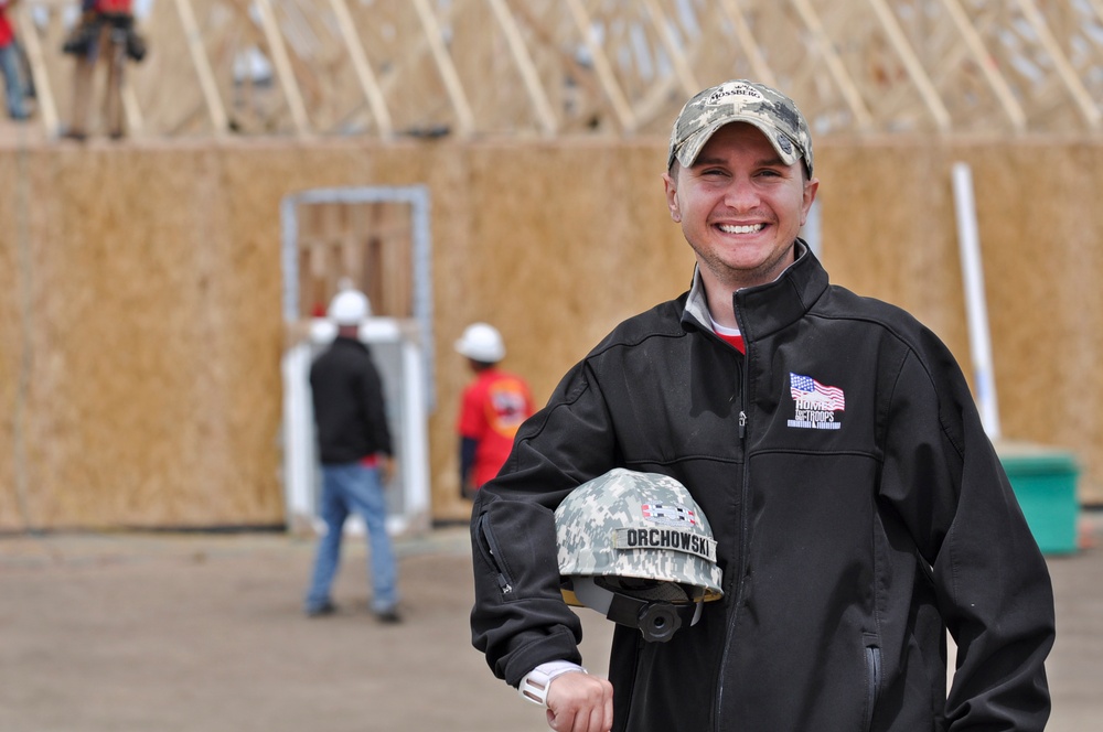 Buckley service members support home construction for injured vet