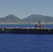 USS Carl Vinson salutes USS Arizona memorial