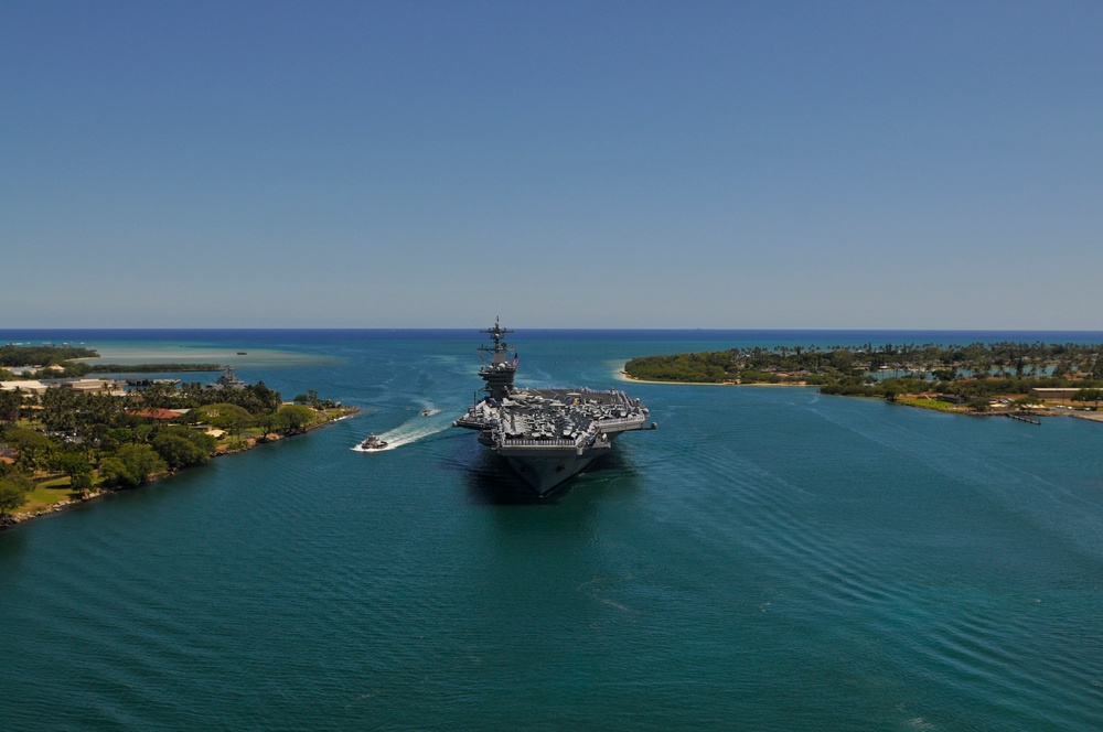 USS Carl Vinson salutes USS Arizona memorial