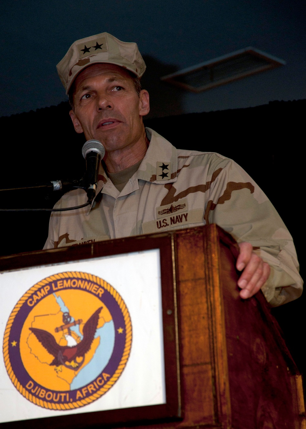Rear Adm. Michael Franken makes a speech as the guest speaker during the change of command ceremony for Camp Lemonnier.