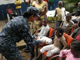 Swift, NAVEUR band entertain children at Pointe Noire orphanage