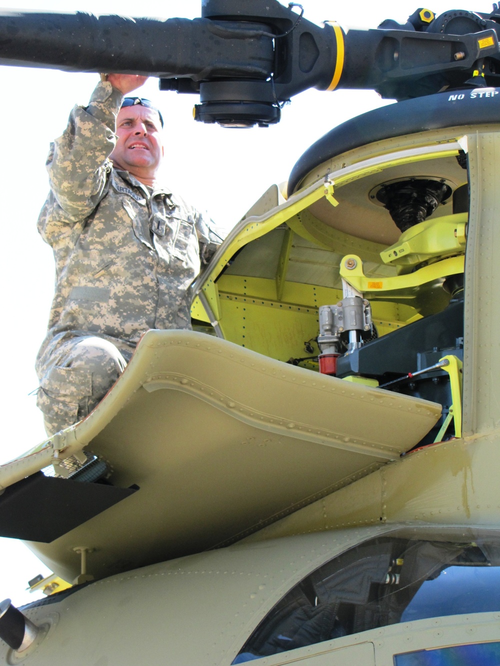 CH-47F pilot conducts hub inspection