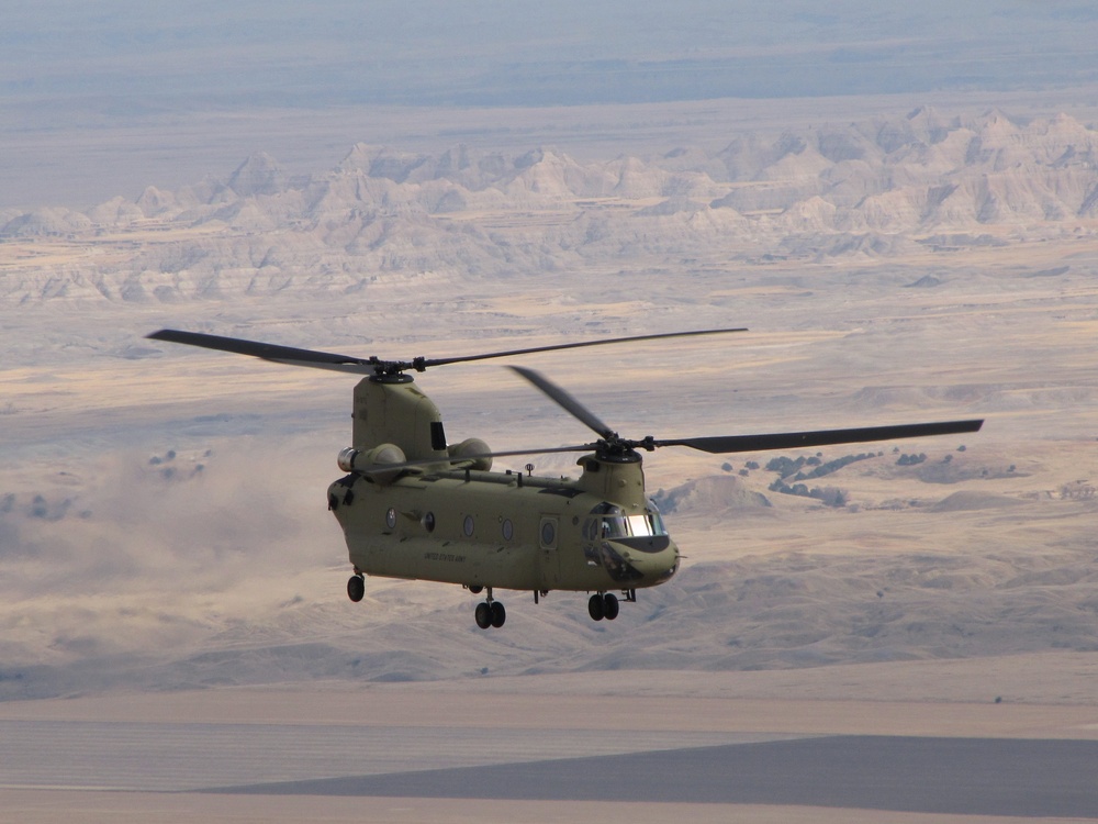 CH-47F flies over Badlands