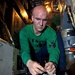 USS Enterprise sailor repairs cable