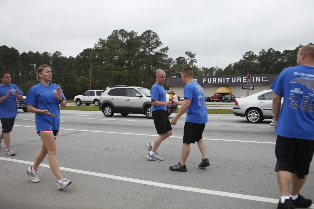 Cherry Point Marines and local law enforcement agencies pass the torch for good cause