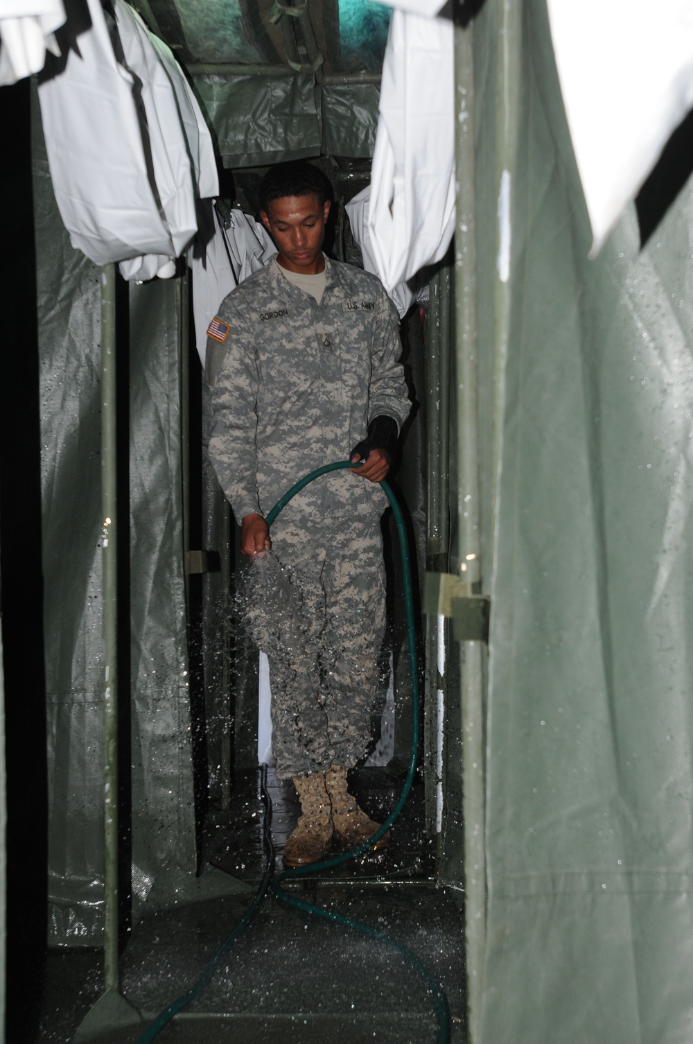 Quartermasters boost morale by providing showers during gunnery