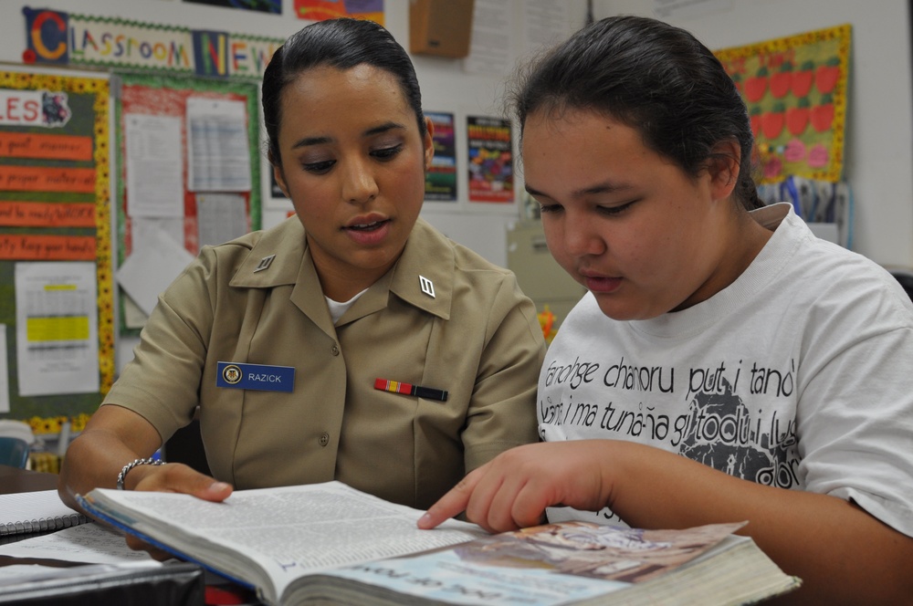 USS Emory S. Land sailors tutors students